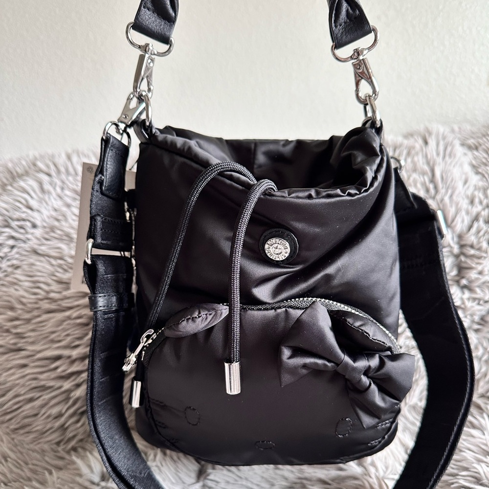 Kipling, Hello Kitty, small bucket bag with detachable straps and handle.